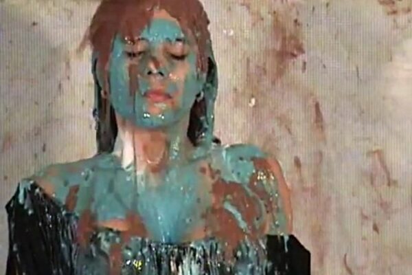 A very cute girl slimed in clothes